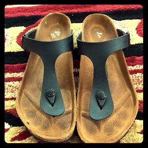 Black Birkenstock sandals. Not formed to foot yet!